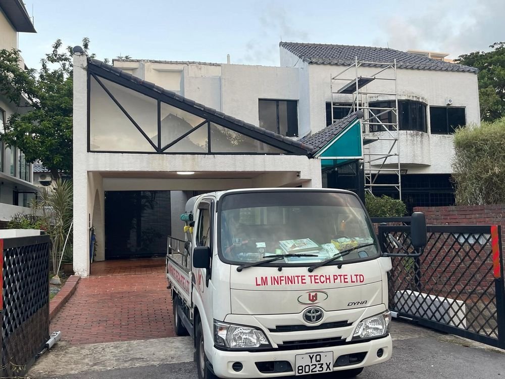 LM Infinite Tech company pickup truck on a job site in Singapore