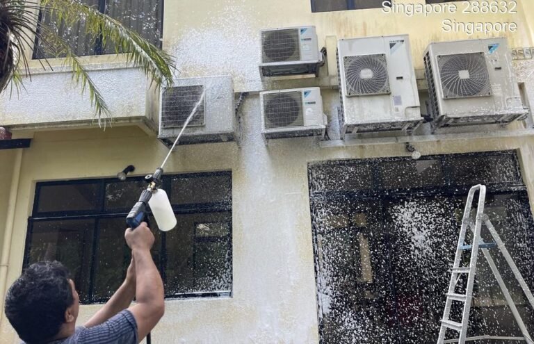 Exterior wall and condenser unit cleaning at a commercial premises