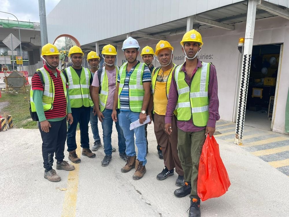 LM Infinite crew in hi-vis vests and helmets on site in Singapore